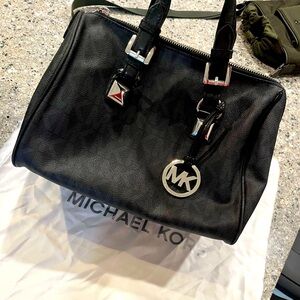 Micheal Kors handbag. Good used condition. Silver accents.